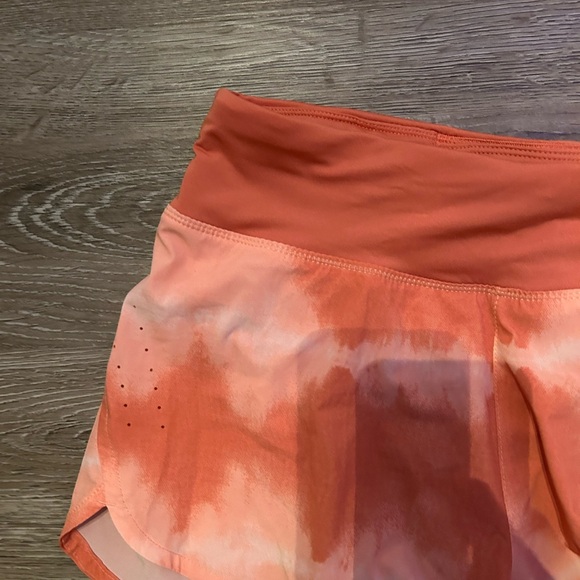 Nike Orange Athletic Shorts with Lightweight Fabric and Curved Hem - Picture 3 of 7